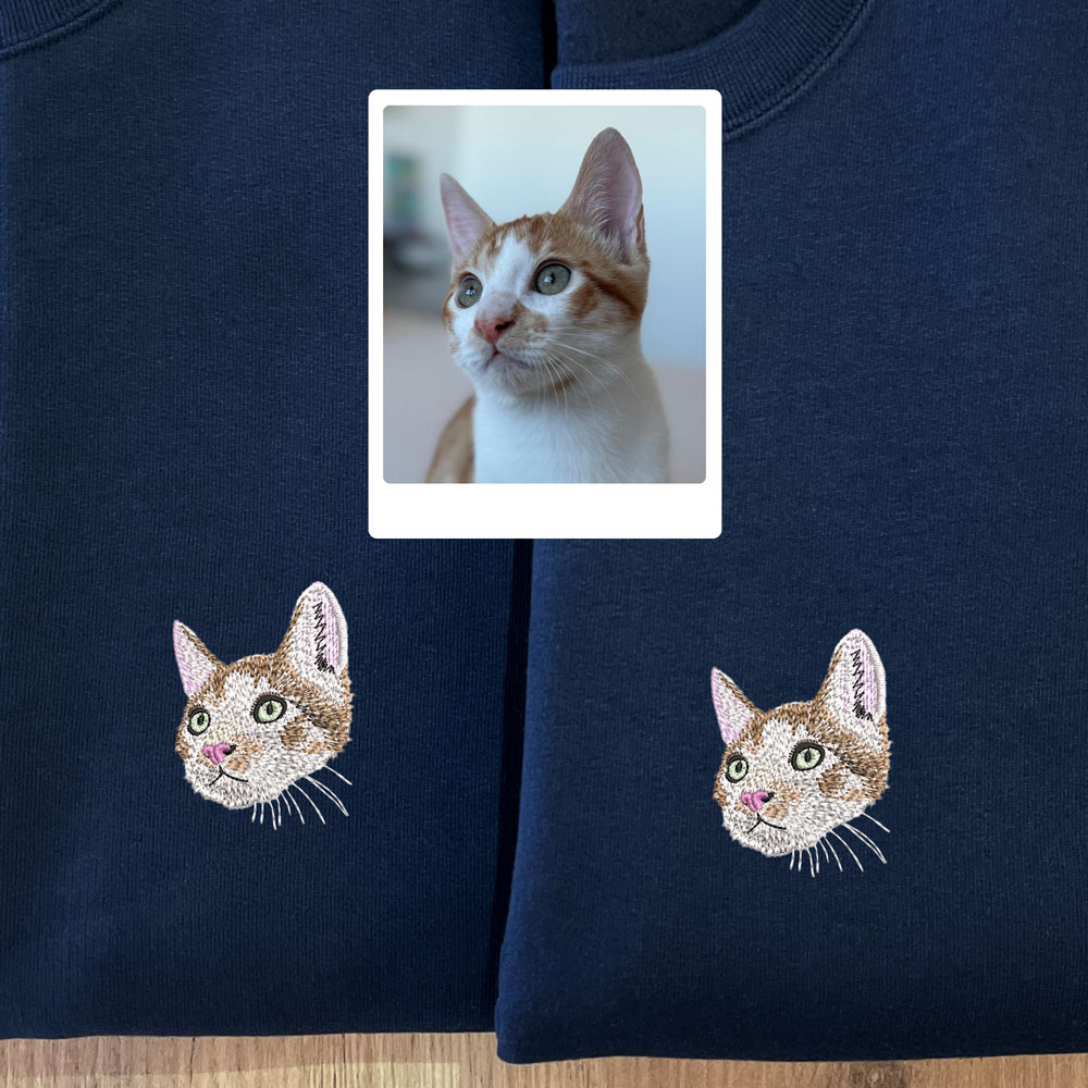 Sudadera con mascota bordada